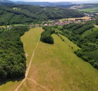 The landscape in the agricultural and forest lands of Žitná - Radiša with meadows and dense forests.