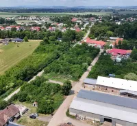 Aerial view of the Parchovany Industrial Area with surrounding residential plots.
