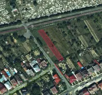 Aerial view of unusual properties in Snina with marked plot.