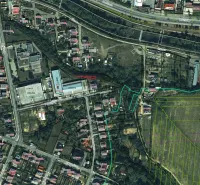 Aerial view of a part of peculiar properties and roads in the town of Snina.