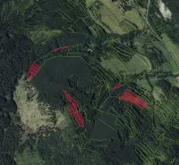 Aerial view of agricultural and forest lands around Horný Tisovník.
