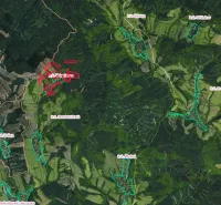 Aerial view of agricultural and forest lands around Valentovce with color highlights.