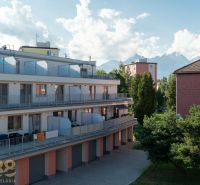Apartment complex on 9th May Street in the town of Svit with a view of the mountains.