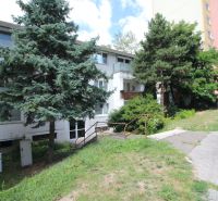 The exterior of an apartment building surrounded by greenery on Talichova Street in Bratislava - Dúbravka.