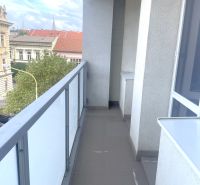 A balcony with a view of historic buildings on Puškinova Street in Košice, 3-room apartment.