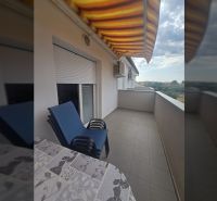 The balcony of a 2-room apartment on Mulo Street in Vrsi with a view of the surroundings.