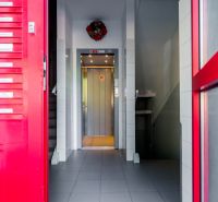 Entrance hall with elevator and staircase in a 2-bedroom apartment, Trnava.