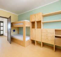 Children's room in a 3-room apartment with a bunk bed and a wooden decor floor.