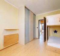 Children's room in a 3-room apartment with a bunk bed and a wooden decor floor.