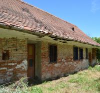 A family house in Lakšárska Nová Ves with a brick facade and a sloped roof.