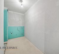 In Zlaté Klasy, there is an unfurnished room in a 2-room apartment.