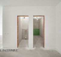 Empty rooms in a 2-room apartment, ready for furnishing.