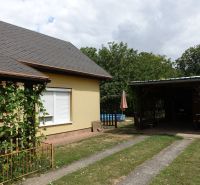 A family house on the Third Row in Mojmírovce with a pergola and a swimming pool in the garden.