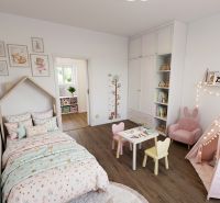 Children's room with a crib, table, and floor with wooden decor in a 4-room apartment.