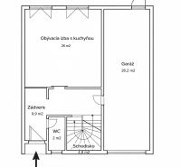 Floor plan of a family house: living room with kitchen, entrance hall, toilet, staircase, garage.