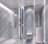 Stylish bathroom in a holiday apartment with a modern shower and designer sink.