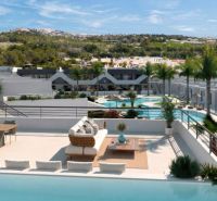 A terrace with a view of the pool in a 3-bedroom apartment on the Costa Blanca.
