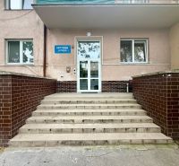 The entrance to the hostel on Dlhé Hony Street in Trenčín with a brick veneer.