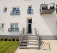 In Liptovský Mikuláš, there is a 3-room apartment with a balcony, and a staircase with a landscaped surrounding.