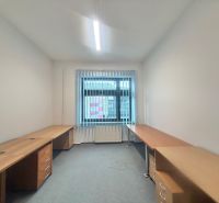 Offices with wood-patterned flooring, work desks, and blinds.
