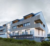 Modern architecture of the apartment complex in Mlynica with balconies and green surroundings.