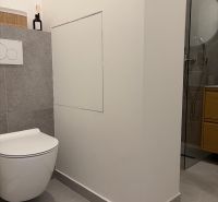Bathroom with toilet and shower in a 3-room apartment.