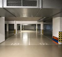 Underground parking spaces no. 122 and no. 123 in the residential building.