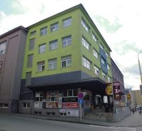 The building on Masaryk Street in Prešov contains offices and a pizzeria.