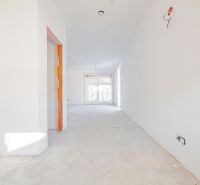 A practical view into the interior of a family house with a cement floor and distribution panel equipment.