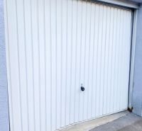 White garage door on Belanská, Košice - Staré Mesto district.