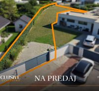 A plot on Mlynský Klin in Senec ready for living, surrounded by greenery.