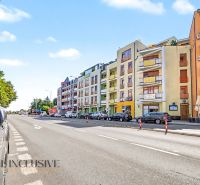 Galantská cesta Street in Dunajská Streda with parked cars and apartment buildings.