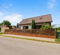 Family house on Kvetinárska Street in Bratislava - Podunajské Biskupice, with a wooden fence.