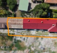 A family house in Vydrany with a red roof and an entrance from the garden.