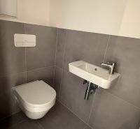 A small bathroom in a 3-room apartment with a toilet and a sink.