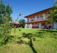 A family house in Podhájska with a large garden and a gazebo for relaxation.