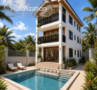 A family house in Pwani Mchangani with a pool, tropical plants, and three floors.