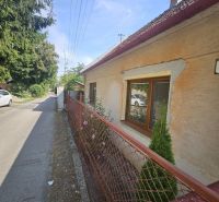 A family house on Stračia Street in Nitra with a fence and a well-maintained garden.
