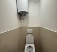Toilet with wall-hung WC and boiler in a 3-room apartment.
