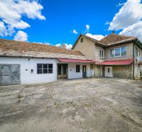 A family house in Hajnáčka with a spacious yard and a roof covered with tiles.