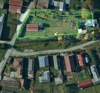 Aerial view of a wooden house with land on Jána Švermu Street in Šumiac.