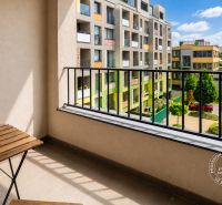 Balcony of a 2-room apartment in Bratislava - Dúbravka, Nejedlého, with a view of the building complex.