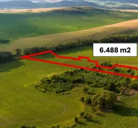 Meadow with a highlighted plot in Liptovský Trnovec among Special Properties, natural landscape, hills.