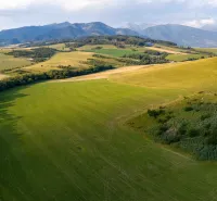 A view of the vast fields in Liptovský Trnovec with mountains. Unusual properties.