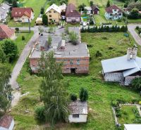 Aerial view of properties - housing in Dúbrava with older buildings and greenery.