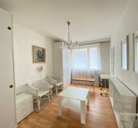 A room with light furniture and a floor with a wood decor, 4-room apartment.