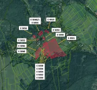 Map of agricultural and forest land near the village of Nová Bystrica with highlighted parcels.