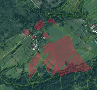 Orthophoto map of agricultural and forest lands around Nová Bystrica.