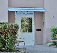 The entrance area of a 3-room apartment on Martina Rázusa Street in Michalovce surrounded by greenery.
