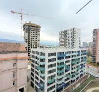 A view of the construction of residential buildings and a crane on Jégého Street in Bratislava - Ružinov.